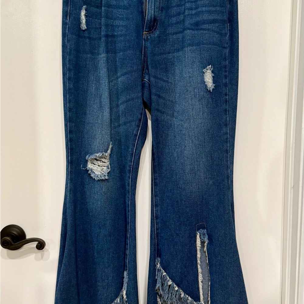 Distressed Blue Denim Jeans